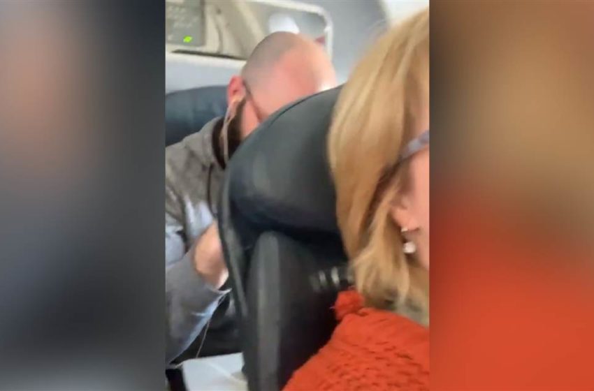  Man Repeatedly Punches the Back of a Woman’s Back Seat for Reclining