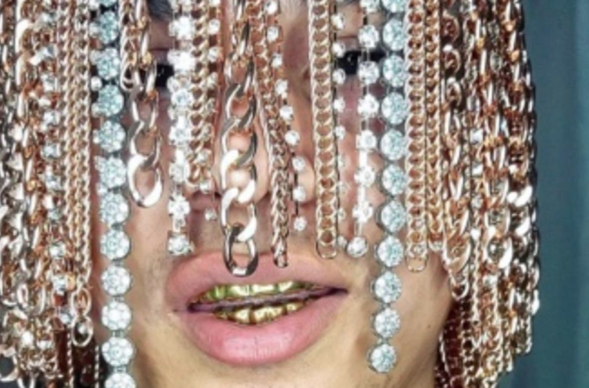  Reggaeton Star Says He’s The First Rapper To Wear Gold Chains As Hair After Having Chains Implanted In Head