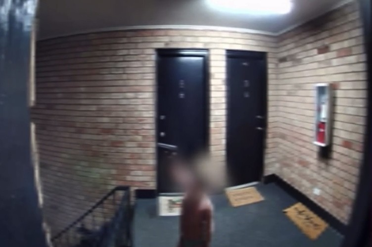  Man Arrested On Live TV After Toddler Is Seen Roaming Apartment Hallway With Handgun